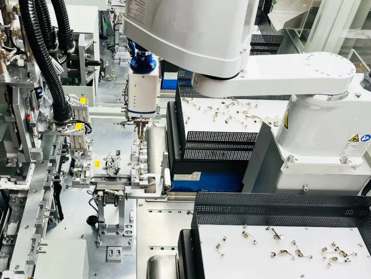 Custom robotic arm automation system for manufacturing